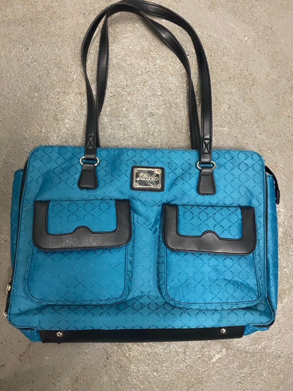 Teal Shoulder Bag with Black Trim and Dual Front Pockets